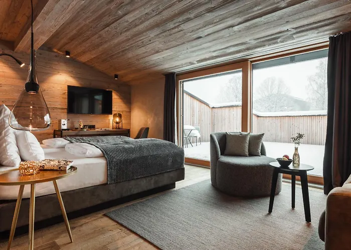 호텔 Alpenhotel Am Schwarzsee 4*